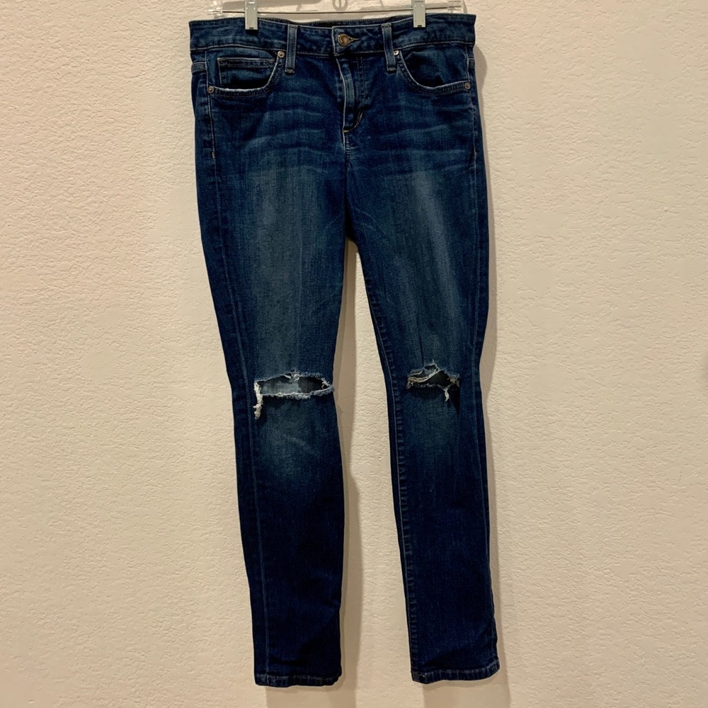Low rise ripped boyfriend jeans.